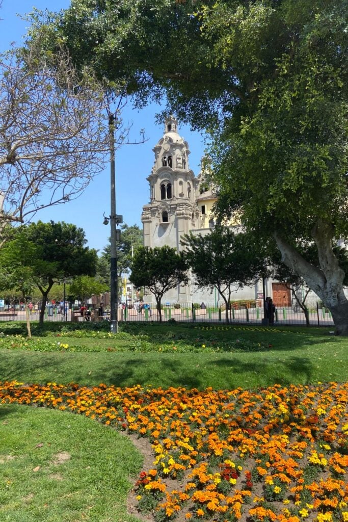 Kennedy Park with flowers and a church