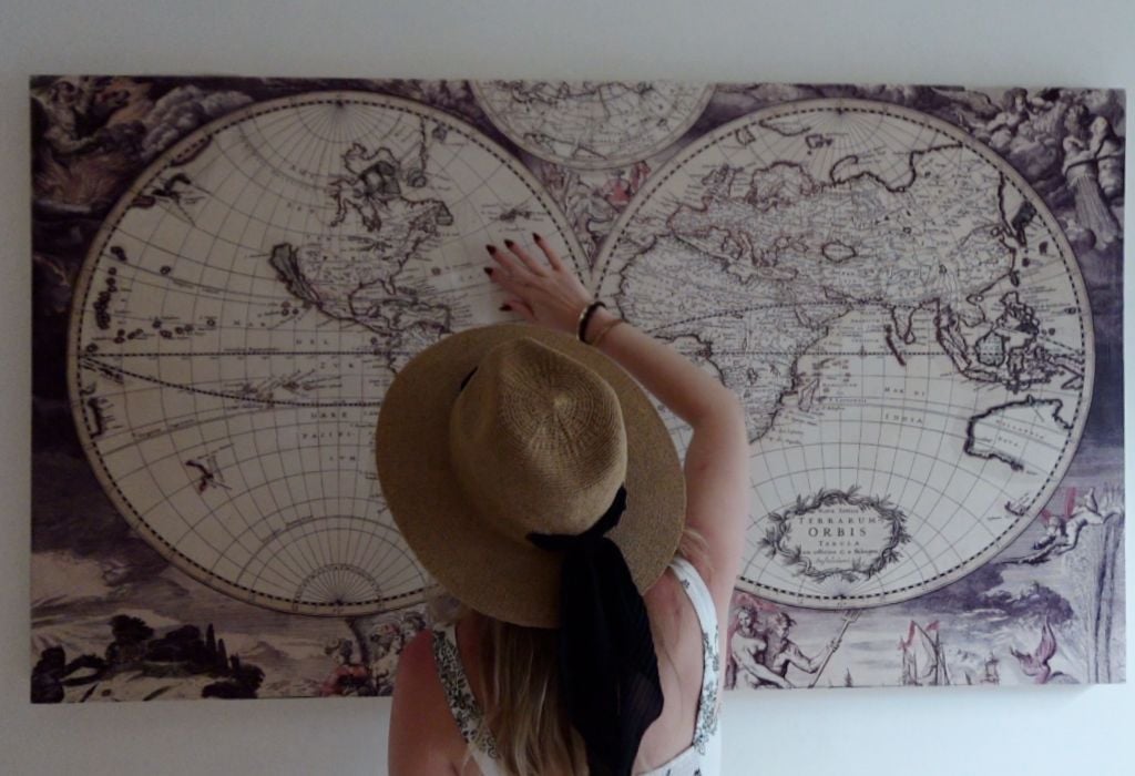 map girls looking at a map