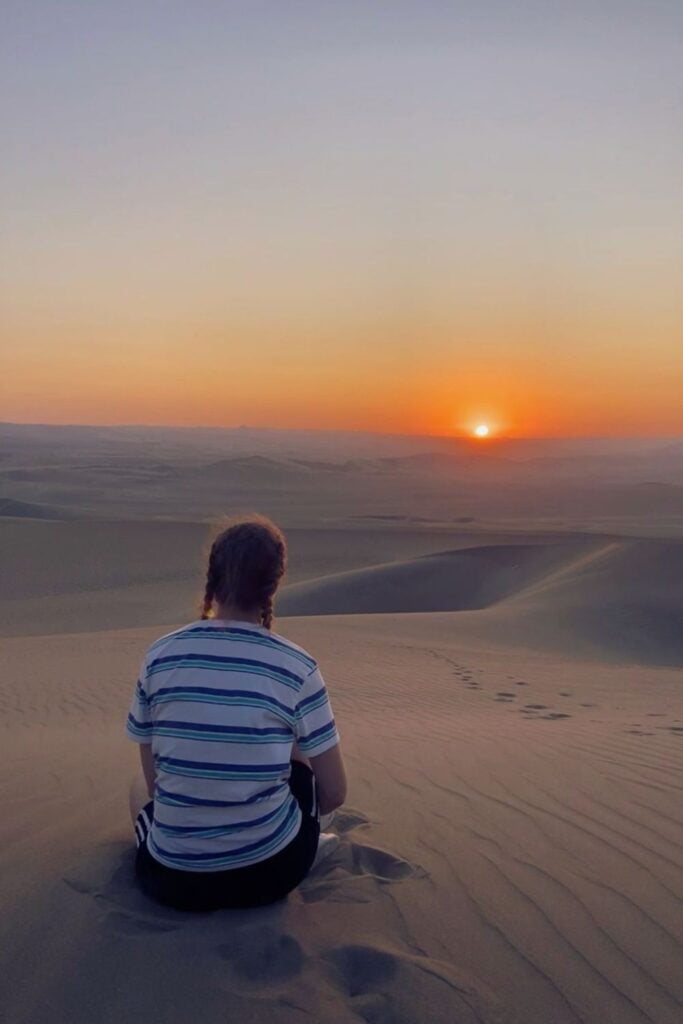 Sunset at Huacachina dunes in Peru on a 10 day Peru itinerary