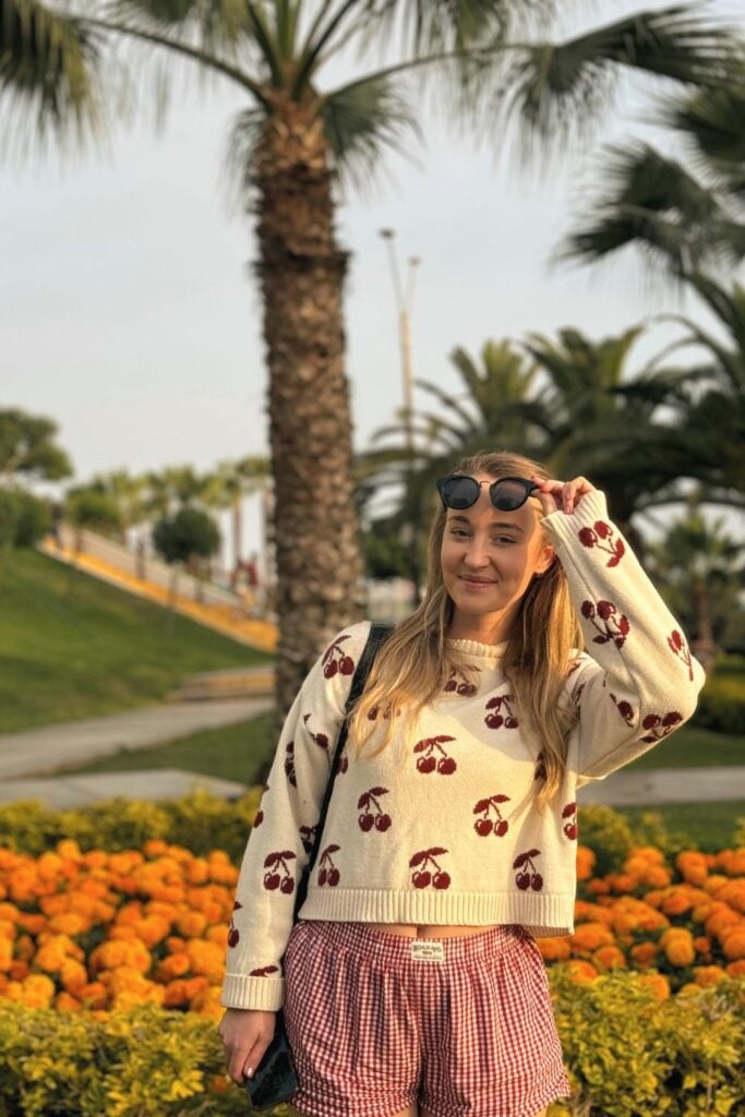 A girl walking along the Malecon in Lima, Peru