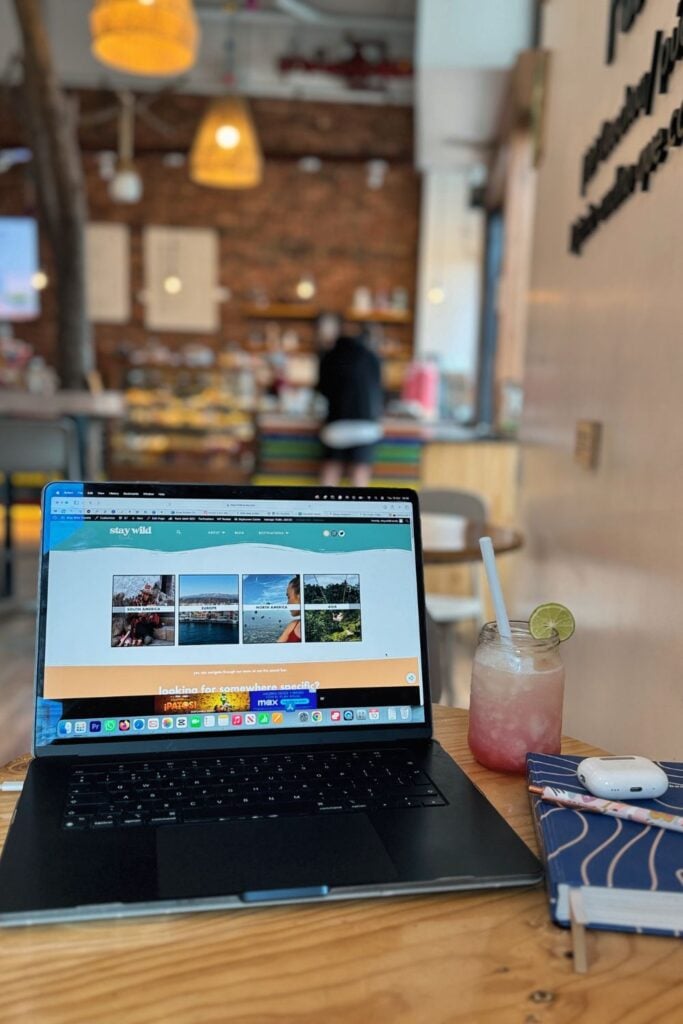 laptop in a cafe working abroad