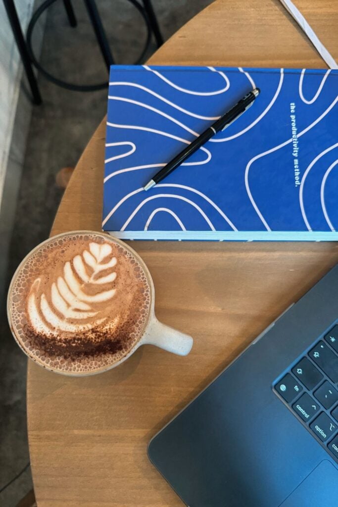 notebook and coffee working abroad